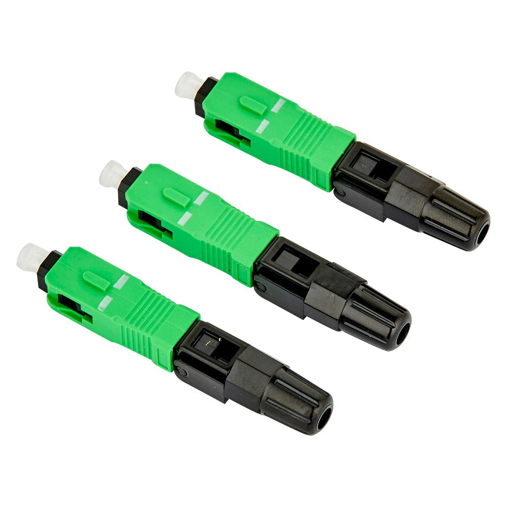 Three green and black fiber optic LC to MTRJ adapter connectors arranged diagonally on a plain white background.