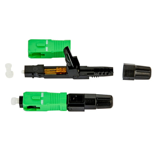 Two green and black fiber optic connector splices with a small white plastic tool and a black cap, displayed on a clean white background.